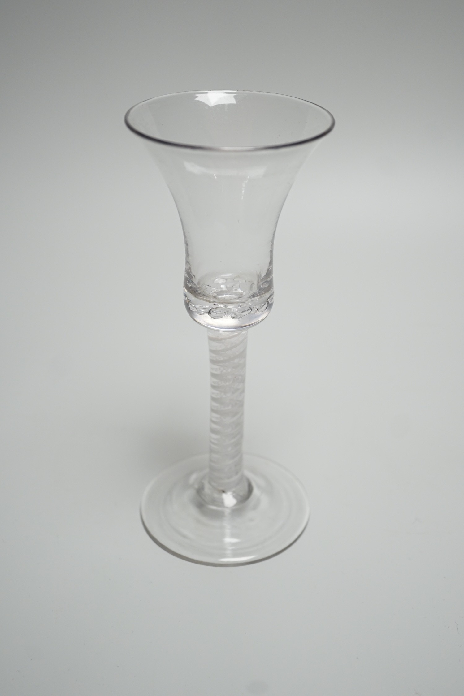 An 18th century Double series opaque twist stem wine glass. 18.5cm tall